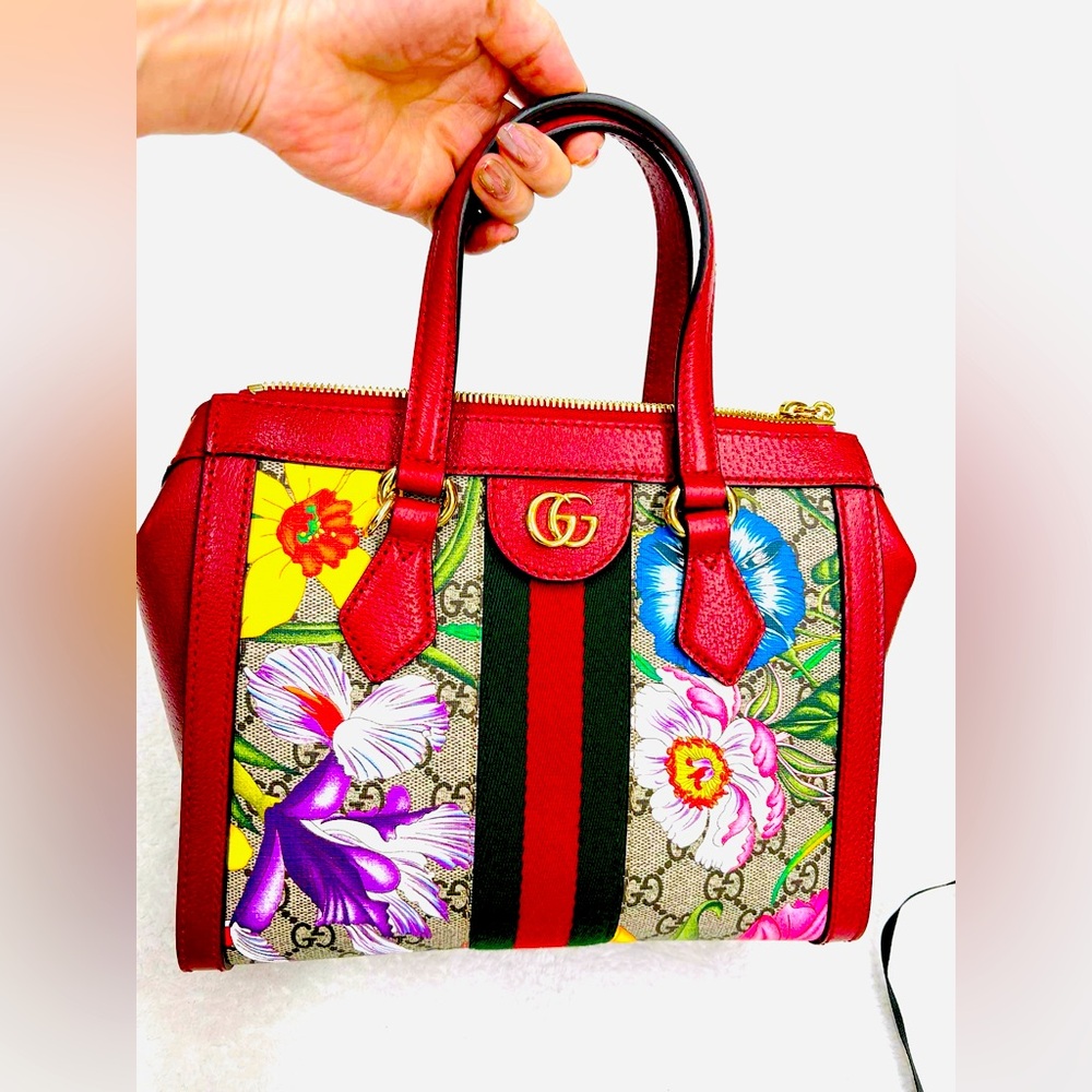 Gucci 2 way bag limited edition with flower design. Looks really new!No flaws!